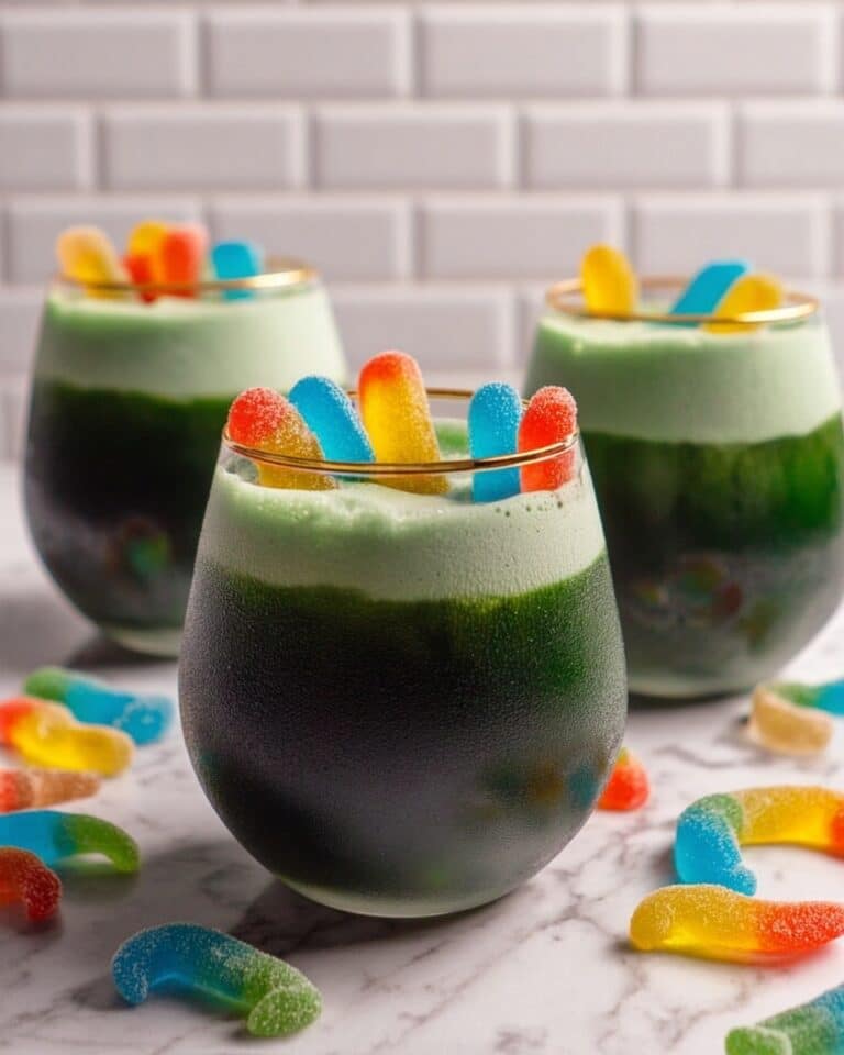Toxic Waste Green Halloween Punch with Foamy Toxic Waste and Gummy Worms Recipe