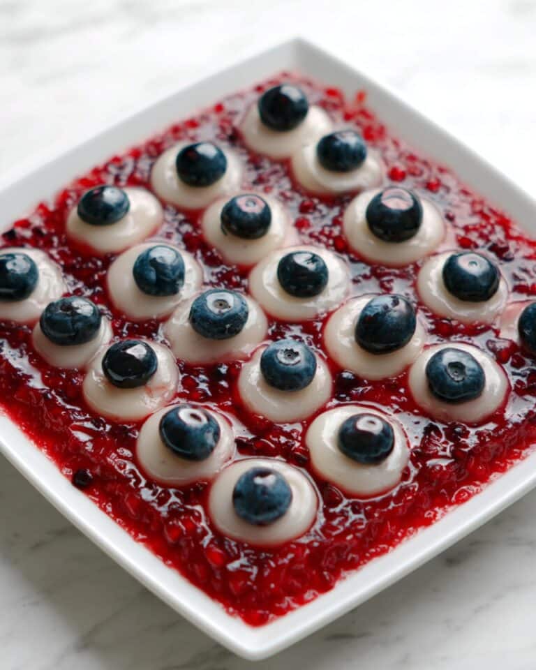 Bloody Eyeballs (Blueberry Stuffed Longans in Berry Sauce) Recipe