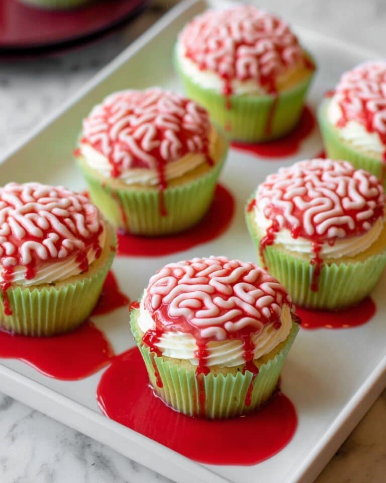 Halloween Strawberry Cupcakes with Strawberry Buttercream and Drizzled Strawberry Syrup Recipe