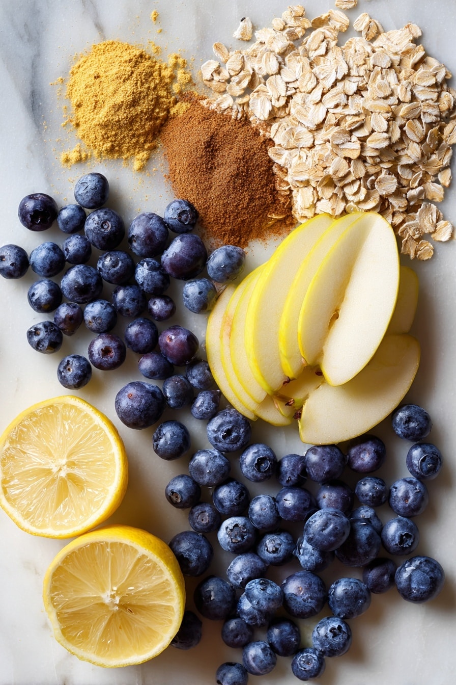 Apple and Blueberry Crumble, fruit crumble recipe, easy fruit dessert, baked berry apple crumble, homemade crumble with oats - Flat lay of fresh plump blueberries with their deep blue and purple hues, thinly sliced crisp apples displaying their pale yellow flesh and smooth skin, light brown rolled oats scattered with their rough texture, packed brown sugar in rich caramel tones, golden melted vegan butter glistening softly, warm cinnamon powder in a small natural heap, and bright fresh lemon halves showing vibrant yellow and juicy segments, all beautifully arranged with natural spacing and overlapping layers, placed on white marbled surface, photo taken with an iphone --ar 2:3 --v 7