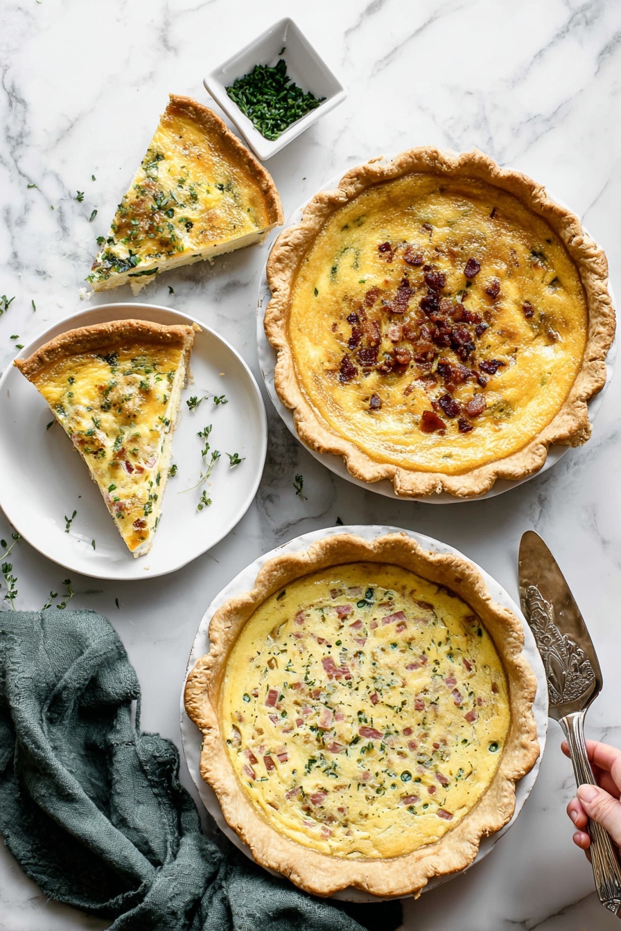 Cheese and Egg Quiche, easy quiche recipe, brunch breakfast dish, savory egg tart, customizable quiche - The image shows three quiches on a white marbled surface. The top right quiche has a golden yellow smooth filling with a slightly browned top and a thick golden crust; one slice is missing and placed on a small white plate beside it. The middle left quiche has a creamy yellow filling with small green herbs and bits of browned bacon sprinkled on top, with a thick golden crust. The bottom right quiche has a mixed filling of creamy yellow with green leafy vegetables and pink ham chunks scattered inside, topped with melted cheese and a golden crust. Nearby, a white square dish with chopped green herbs and an olive green cloth napkin are visible. A woman's hand holding a silver serving spatula is resting on the surface near the top right quiche. Photo taken with an iphone --ar 2:3 --v 7