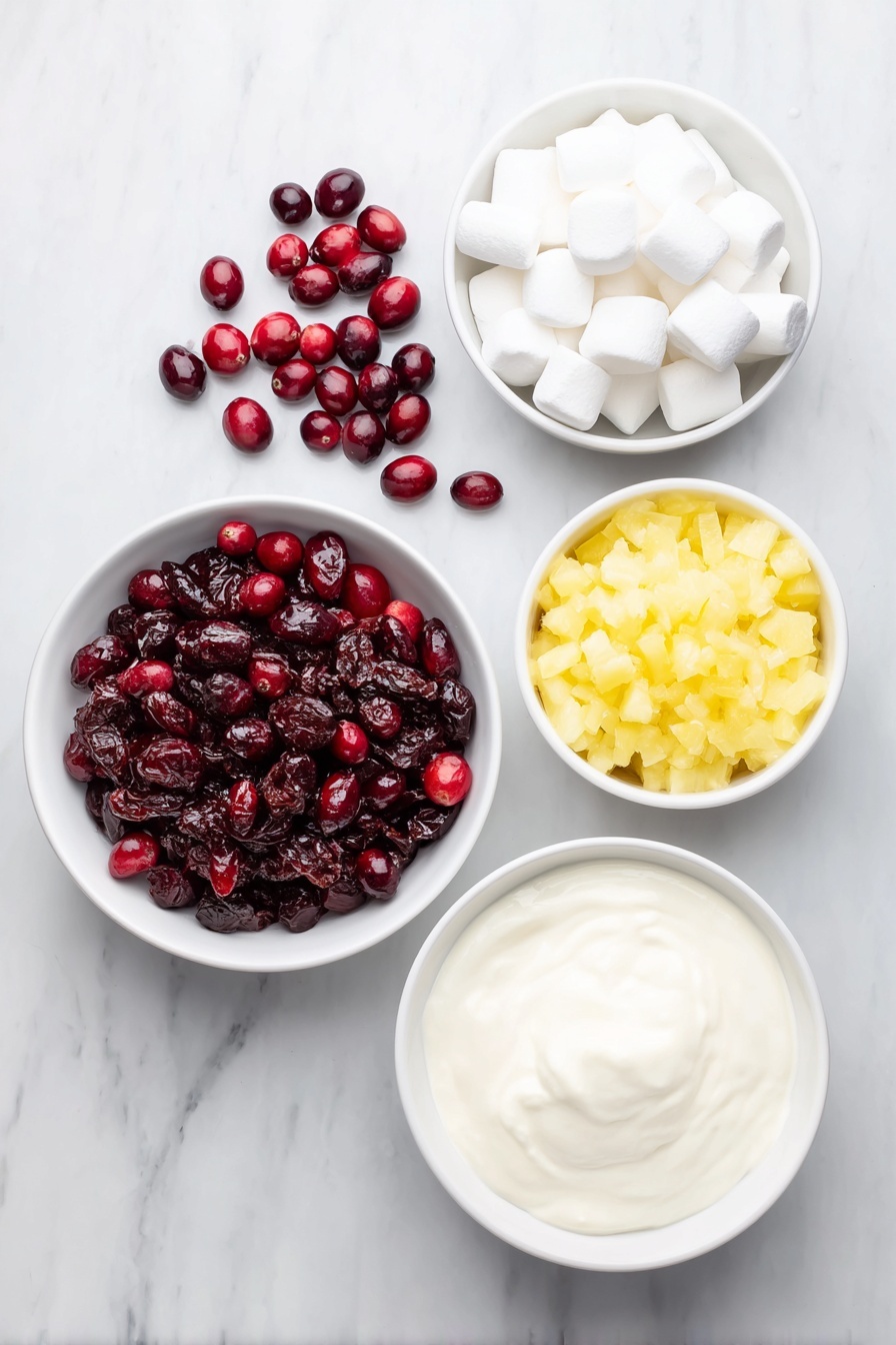Cranberry Fluff Salad, festive salad recipes, holiday fruit salad, creamy cranberry dessert, easy holiday side dishes - Flat lay of fresh whole cranberries scattered in a small pile, a small white ceramic bowl filled with granulated sugar, a small white ceramic bowl holding bright yellow crushed pineapple pieces, a small pile of soft white mini-marshmallows, and a small white ceramic bowl of thick heavy cream placed alongside, all arranged symmetrically on a clean white marble surface, soft natural light, photo taken with an iPhone, professional food photography style, fresh ingredients, white ceramic bowls, no bottles, no duplicates, no utensils, no packaging --ar 2:3 --v 7 --p m7354615311229779997