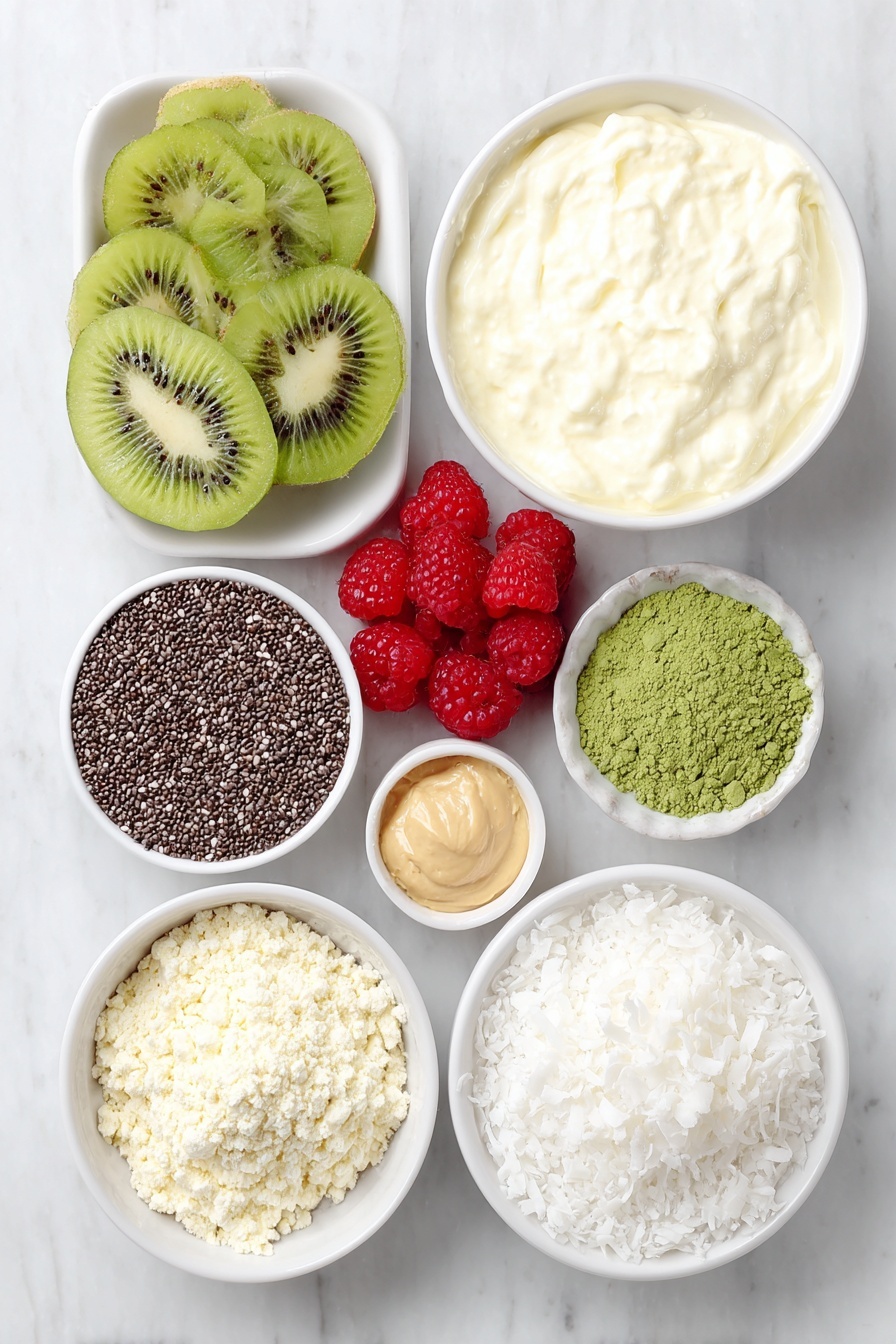 Matcha Chia Protein Pudding, healthy matcha pudding, vegan protein breakfast, quick nutritious snack, plant-based chia pudding - Flat lay of fresh creamy nonfat Greek yogurt in a simple white ceramic bowl, a small white bowl of smooth plant-based milk, a neat pile of glossy black chia seeds on the white surface, a small mound of vibrant green matcha powder, a small white bowl with light beige vanilla extract, a half scoop of fine vanilla whey protein powder shaped into a small mound, a few plump red raspberries, a couple of bright sliced strawberries, a few vibrant green kiwi slices arranged naturally, a small white bowl with creamy almond butter, a small white bowl filled with white coconut flakes, all perfectly arranged with balanced spacing and symmetry, placed on a clean white marble surface, soft natural light, photo taken with an iPhone, professional food photography style, fresh ingredients, white ceramic bowls, no bottles, no duplicates, no utensils, no packaging --ar 2:3 --v 7 --p m7354615311229779997