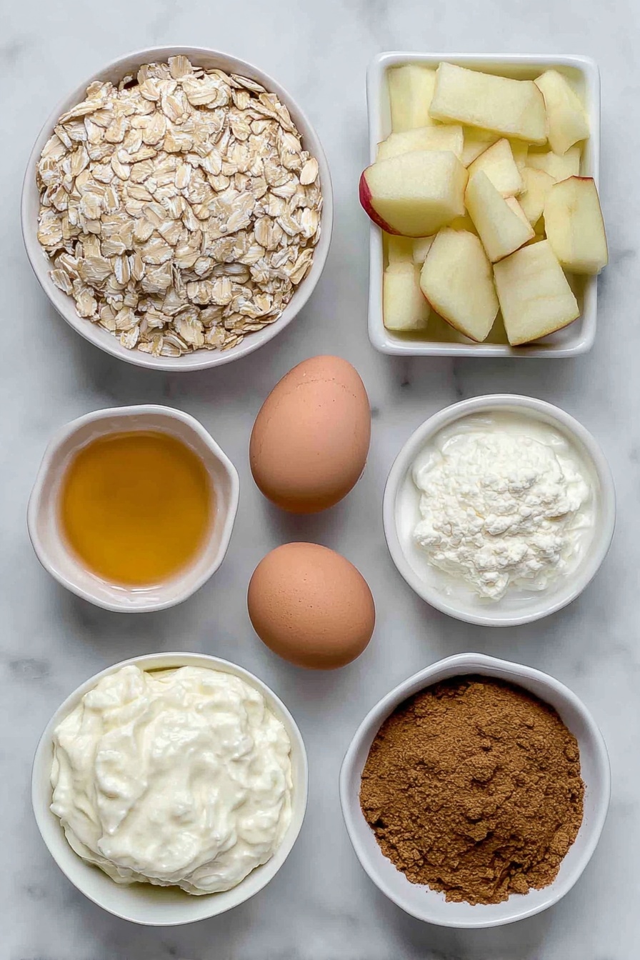 Healthy Apple Oatmeal Cake, gluten-free apple oatmeal dessert, nourishing breakfast cake, flourless apple cake recipe, healthy apple cinnamon treat - Flat lay of a small pile of rolled oats, a large peeled apple chopped into chunks, a few whole brown eggs with clean shells, a small white ceramic bowl filled with golden honey, another small white bowl containing creamy yogurt, a small white bowl with softened butter, a neat mound of ground cinnamon powder, a small heap of fine baking powder, and a small heap of baking soda, arranged symmetrically on a clean white marble surface, soft natural light, photo taken with an iPhone, professional food photography style, fresh ingredients, white ceramic bowls, no bottles, no duplicates, no utensils, no packaging --ar 2:3 --v 7 --p m7354615311229779997