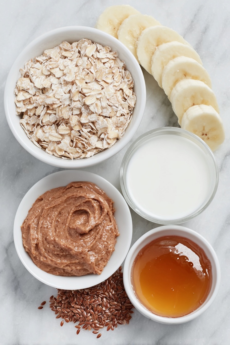 Peanut Butter Banana Overnight Oats, healthy breakfast recipes, quick overnight oats, easy breakfast ideas, banana oatmeal jar - Flat lay of a small mound of rolled oats, a teaspoon of whole flax seeds, a light dusting of ground cinnamon beside a small white ceramic bowl of milk, a small white ceramic bowl filled with amber maple syrup, a dollop of creamy peanut butter on the side, and a perfectly ripe half banana sliced into neat pieces arranged next to the ingredients, all placed on a clean white marble surface, soft natural light, photo taken with an iPhone, professional food photography style, fresh ingredients, white ceramic bowls, no bottles, no duplicates, no utensils, no packaging --ar 2:3 --v 7 --p m7354615311229779997