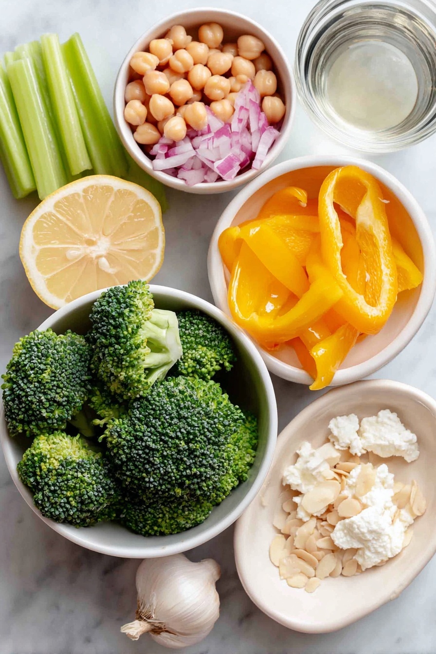 Chickpea Broccoli Salad with Lemon Tahini, healthy chickpea salad, vegan broccoli salad, lemon tahini dressing, quick vegetarian side dish - Flat lay of fresh chopped broccoli florets, a small white bowl of rinsed chickpeas, bright yellow bell pepper pieces, chopped celery stalks, finely chopped red onion, a small white bowl of slivered almonds, crumbled creamy goat cheese, a small white bowl of smooth tahini, a small white bowl with fresh lemon juice, a whole unpeeled garlic clove, and a small white bowl of clear water placed on a clean white marble surface, soft natural light, photo taken with an iPhone, professional food photography style, fresh ingredients, white ceramic bowls, no bottles, no duplicates, no utensils, no packaging --ar 2:3 --v 7 --p m7354615311229779997
