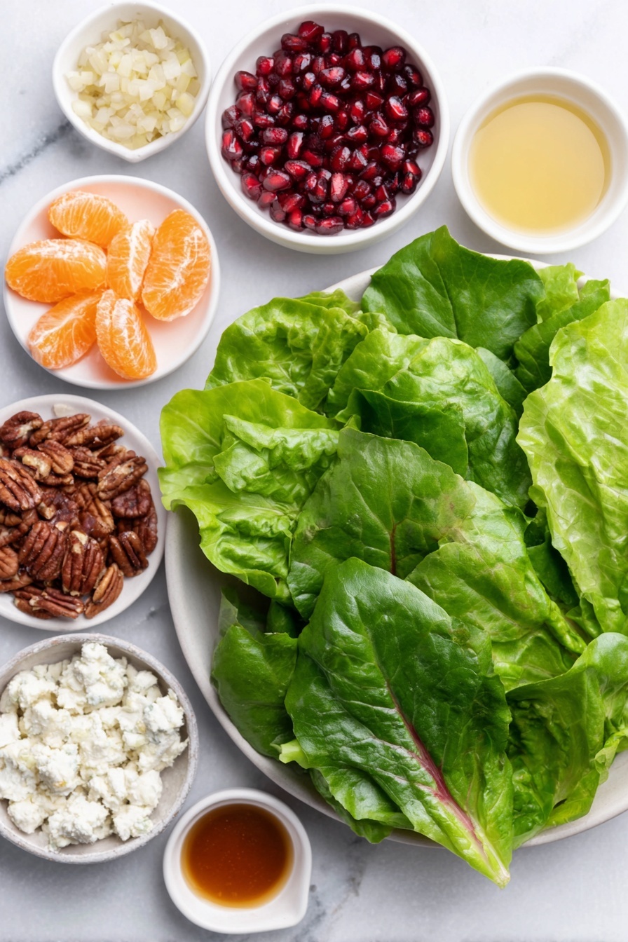 Winter Citrus Salad with Pomegranate and Feta, citrus salad recipe, healthy winter salad, holiday citrus salad, easy citrus and feta salad - Flat lay of fresh mixed spring greens with vibrant green leaves, a small white bowl of bright orange mandarin segments, a small white bowl filled with ruby red pomegranate seeds, crumbled white feta cheese on a simple white ceramic plate, roughly chopped glossy candied pecans scattered neatly nearby, and four small white bowls containing golden olive oil, amber honey, smooth pale Dijon mustard, and light amber apple cider vinegar, along with a small pile of minced shallot on a white ceramic dish, all arranged symmetrically and balanced, placed on a clean white marble surface, soft natural light, photo taken with an iPhone, professional food photography style, fresh ingredients, white ceramic bowls, no bottles, no duplicates, no utensils, no packaging --ar 2:3 --v 7 --p m7354615311229779997